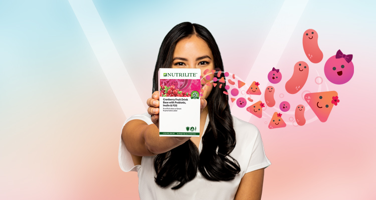 Stylised image of a woman holding the Nutrilite Cranberry Fruit Drink Base with Probiotic, Inulin & FOS 